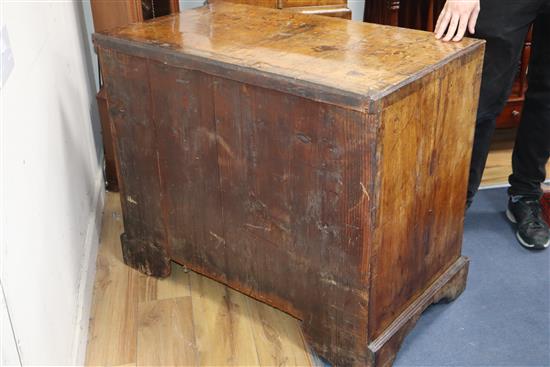 A George II walnut chest of four long drawers W.92cm